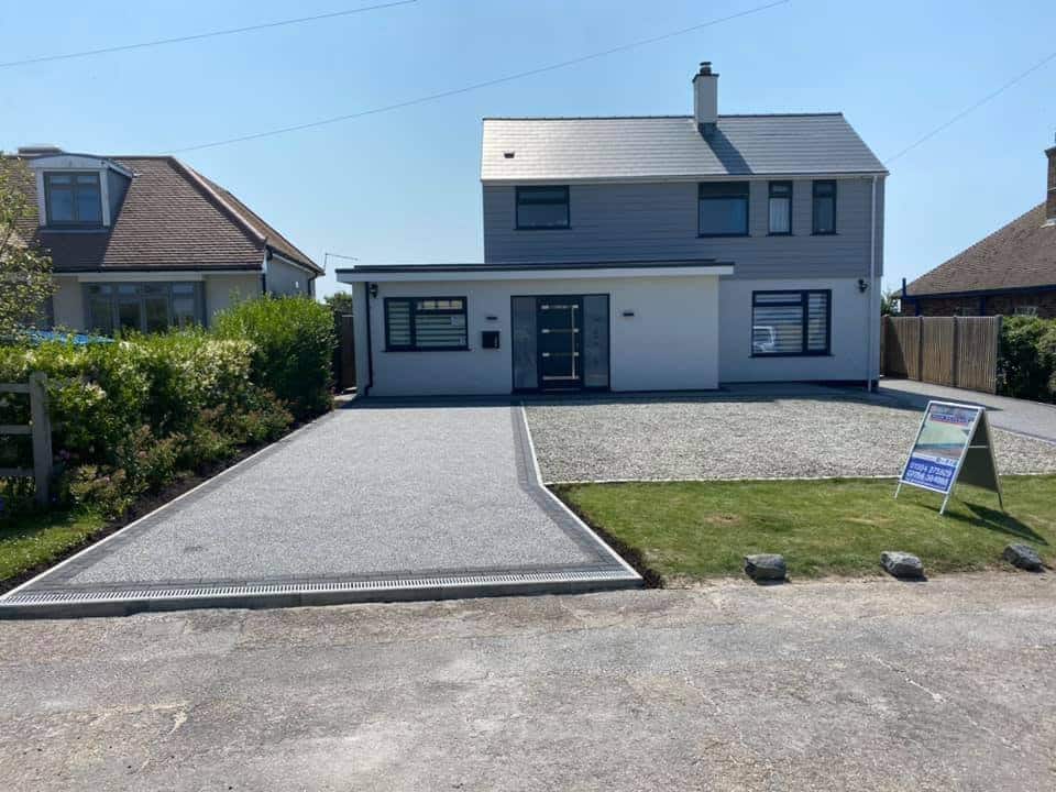 Modern house with resin driveway and front garden